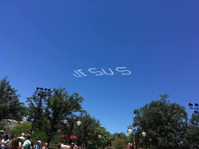 1st day at Disney, Magic Kingdom, Jesus loves you written in the sky